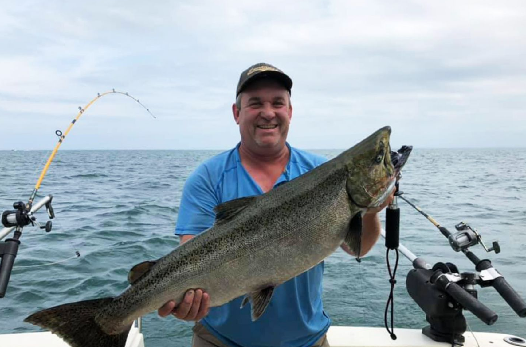 Fun Reeling for Salmon Fish in Lake Ontario